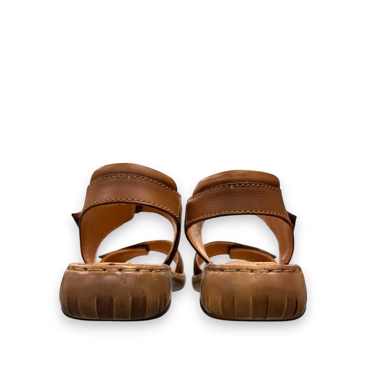 Josef Seibel Debra 019 castagne/kombe brown leather sandals showing the durable handstitched wavy tread soles