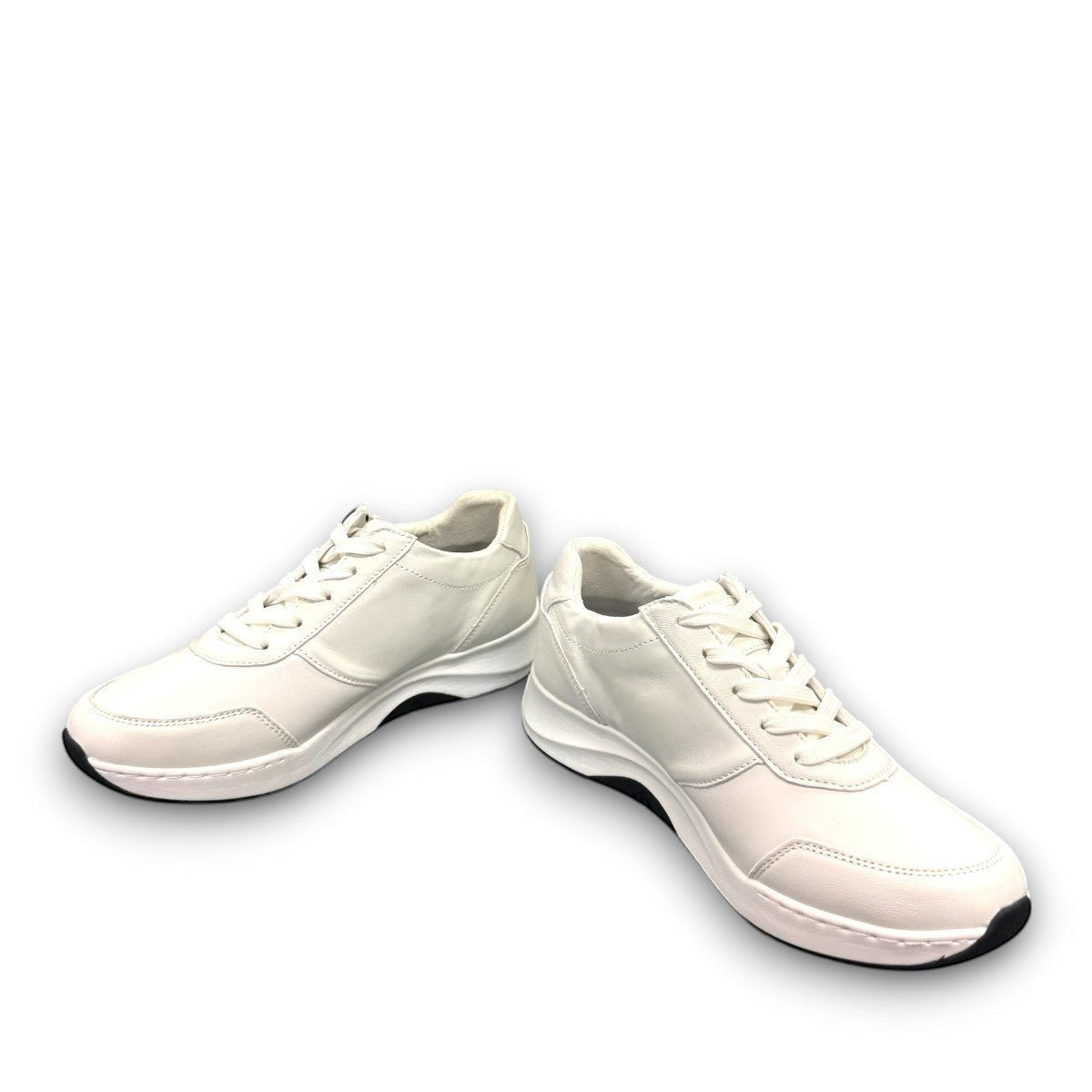 JOSEF SEIBEL ELLI 06 white goat leather sneaker with side zipper, laces, and durable EVA rubber sole.
photo of the front.