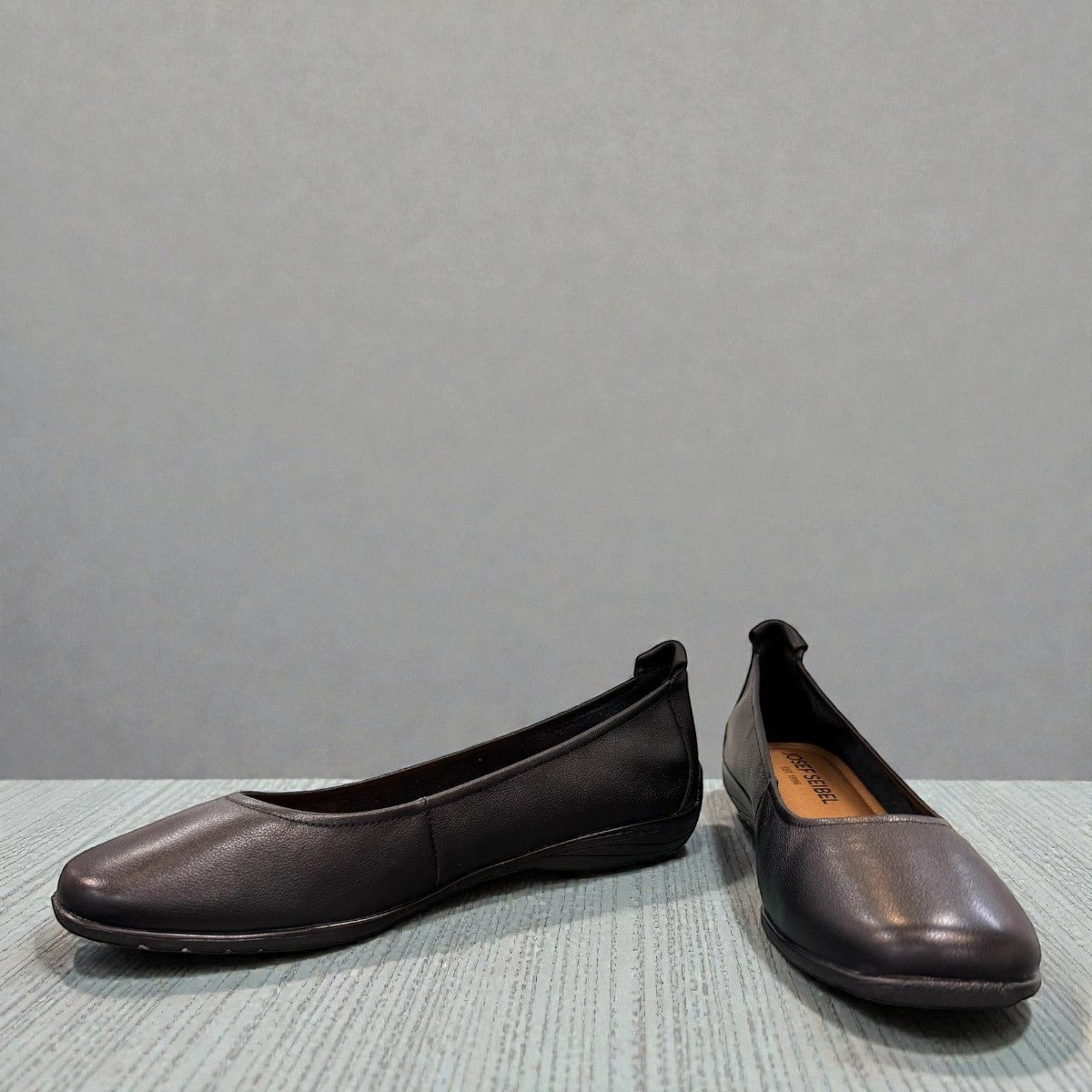 Josef Seibel Fenja 01 black leather flat with burnished toe and rubber outsole.photo of the front.