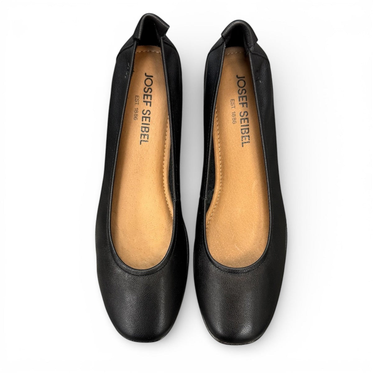 Josef Seibel Fenja 01 black leather flat with burnished toe and rubber outsole. photo of the top.