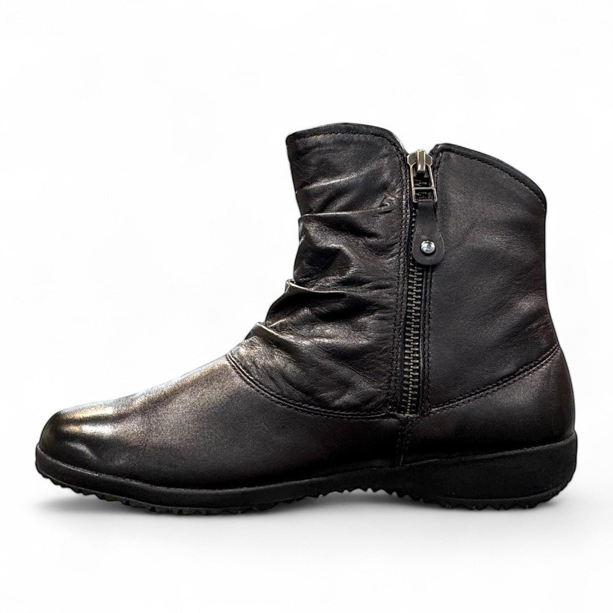 Josef Seibel Naly 24 black leather ruched ankle boot with side zips and low wedge sole.
photo of the left side.
