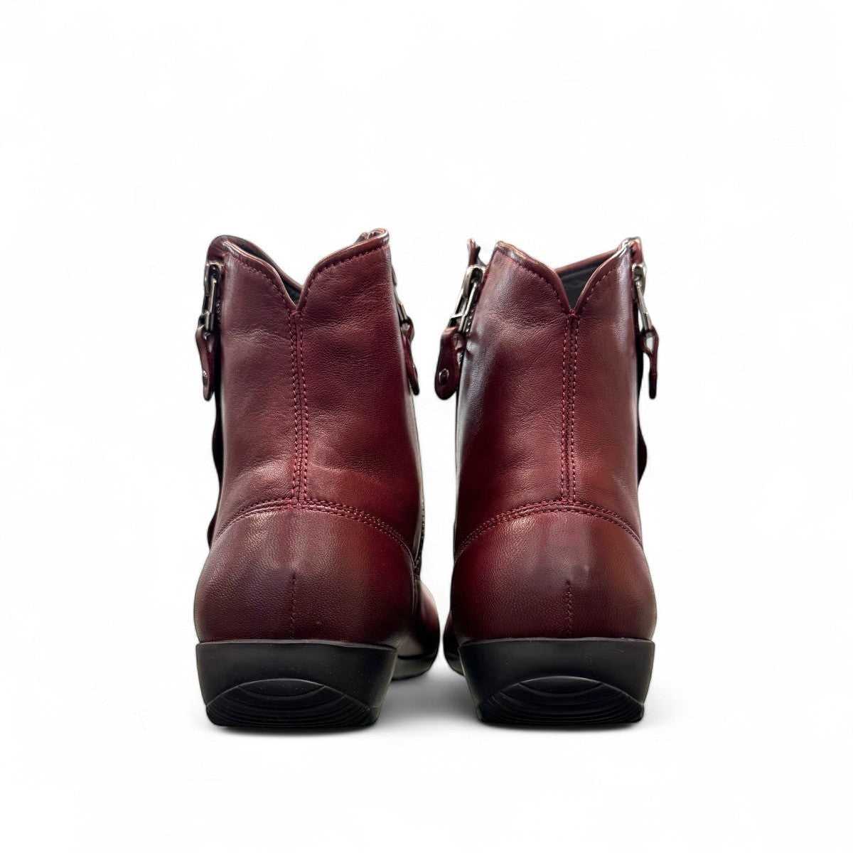 Josef Seibel Naly 24 bordo leather ruched ankle boot with side zips and a low wedge sole. photo of the back.