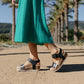 Josef Seibel Quinn 02 wedge sandal in basalt kombi leather with adjustable straps and cork midsole.
photo of the left side.