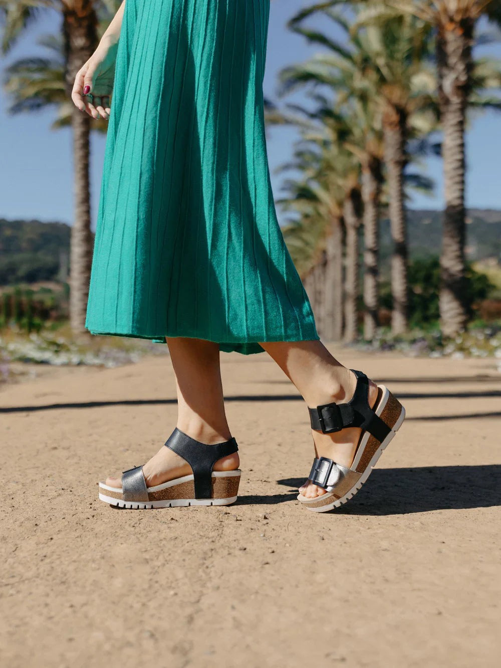 Josef Seibel Quinn 02 wedge sandal in basalt kombi leather with adjustable straps and cork midsole.
photo of the left side.
