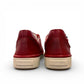 Josef Seibel Claire 03 hibiscus red leather sneaker with side zip and white rubber sole.photo o the back.