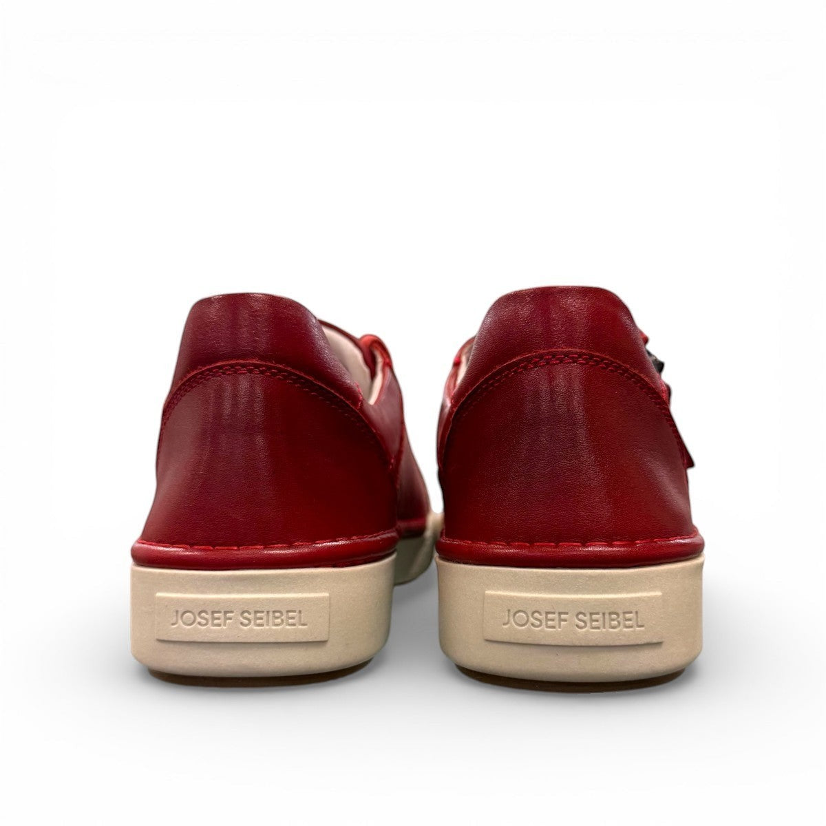 Josef Seibel Claire 03 hibiscus red leather sneaker with side zip and white rubber sole.photo o the back.