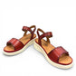 JOSEF SEIBEL Sevran 01 hibiscus leather sandals showing the textured EVA wedge sole from below