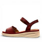 JOSEF SEIBEL Sevran 01 hibiscus leather sandals showing the textured EVA wedge sole from below