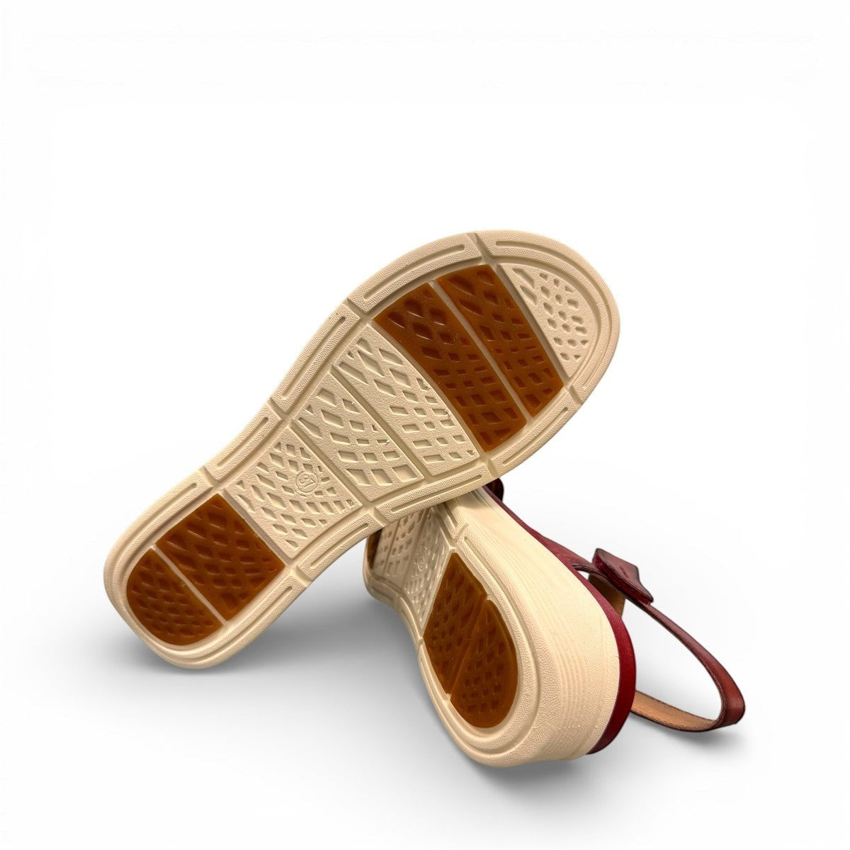 JOSEF SEIBEL Sevran 01 hibiscus leather sandals showing the textured EVA wedge sole from below