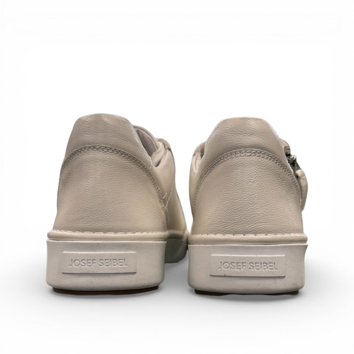 Josef Seibel Claire 03 white leather sneakers with side zip and lace-up closure on a rubber sole. photo of the back.