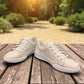 Josef Seibel Claire 03 white leather sneakers with side zip and lace-up closure on a rubber sole. photo of the front.