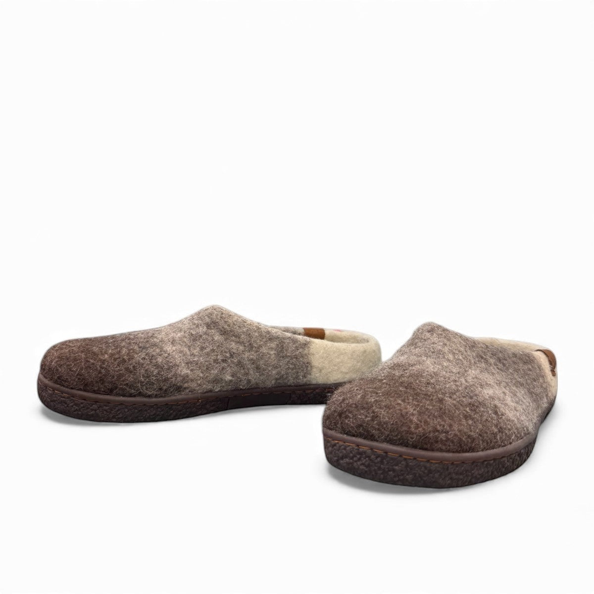 Kathmandu grey wool mule slippers with a comfortable EnergySole rubber base and slip-on design.