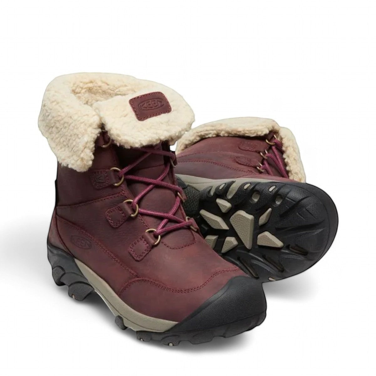 KEEN Betty waterproof winter boot in burgundy leather with a beige faux-fur cuff and rubber outsole