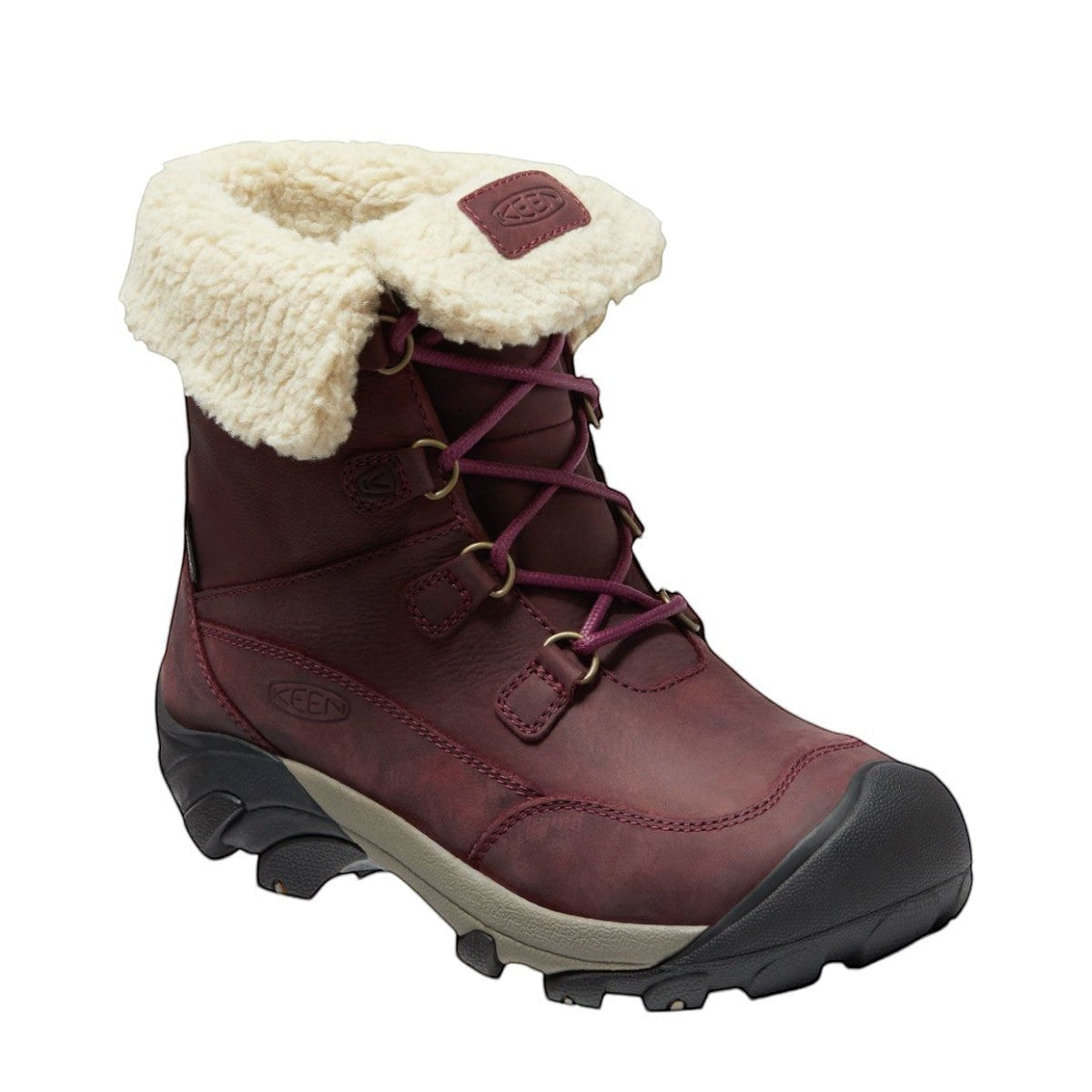 KEEN Betty waterproof winter boot in burgundy leather with a beige faux-fur cuff and rubber outsole