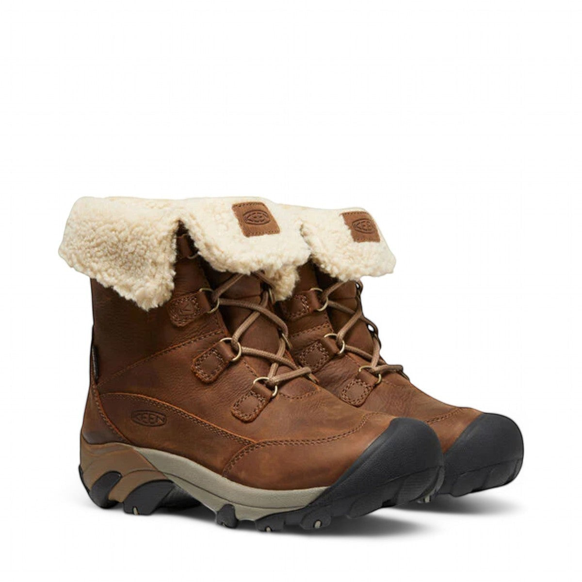 KEEN Betty Boot Short WP women's brown leather waterproof winter boots with cream sherpa lining and lace-up closure.