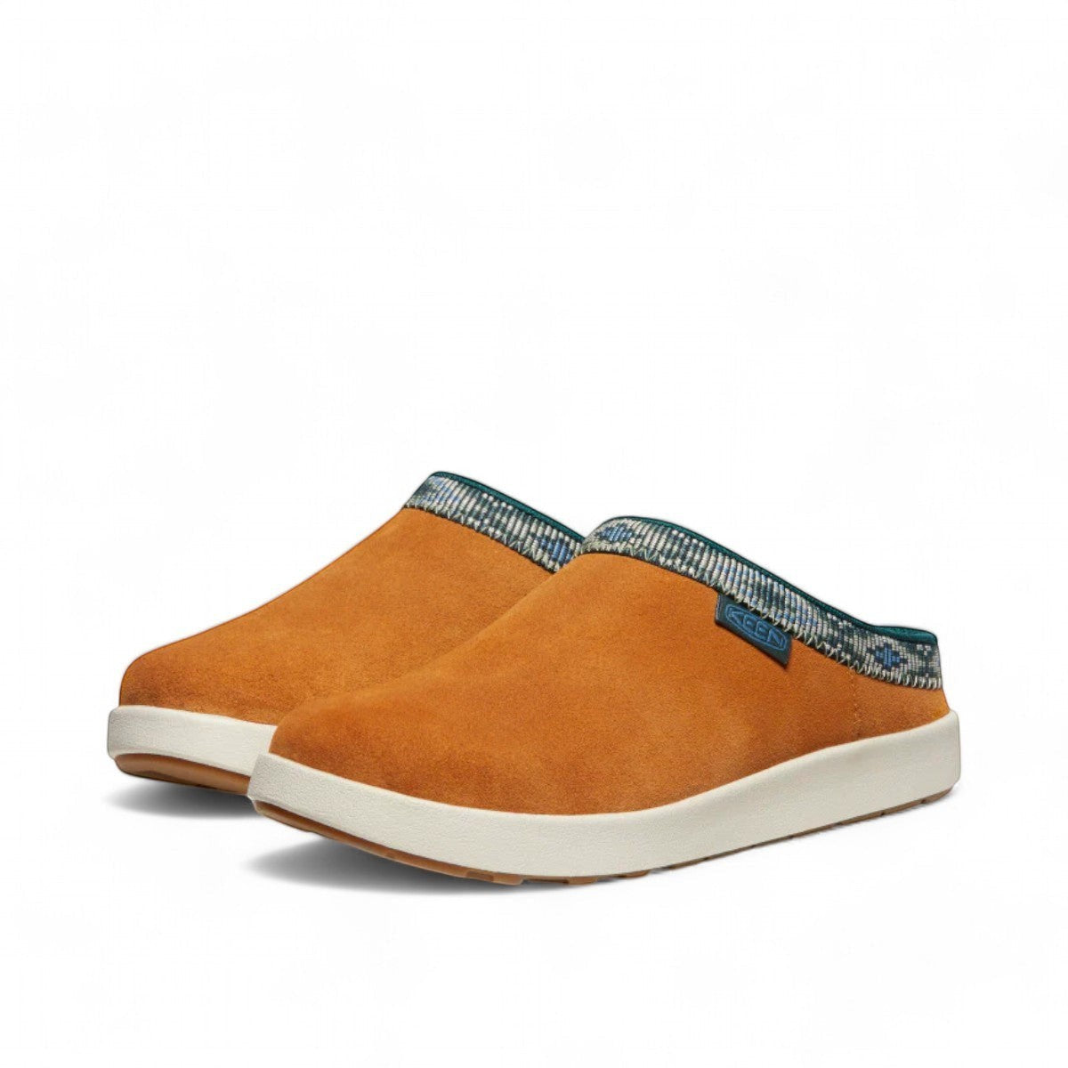 KEEN Elle Suede Mule in orange with a patterned trim and white sole. Comfortable slip-on shoe.