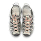 KEEN Astoria West women's hybrid sandal in gray with coral accents. Features recycled materials and a slip-on design.