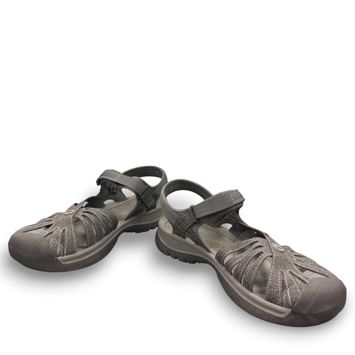 KEEN Women's Rose Sandal in grey gargoyle and raven featuring washable polyester webbing and toe bumper.
