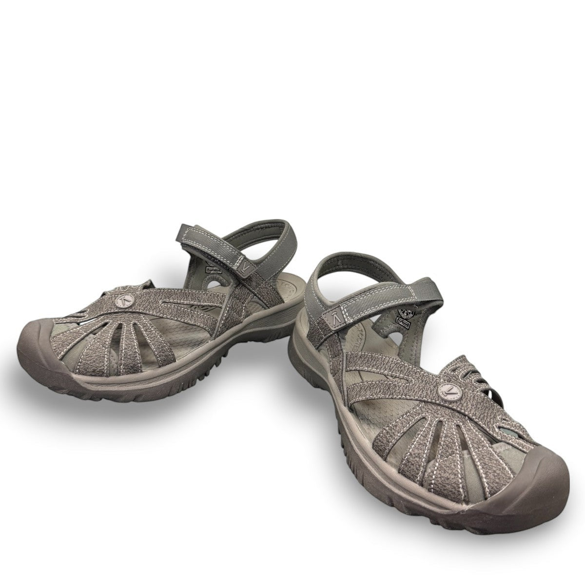 KEEN Women's Rose Sandal in grey gargoyle and raven featuring washable polyester webbing and toe bumper.