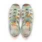 KEEN Astoria West women's hybrid water sandal in terrazzo/granite green with bungee laces and arch support.