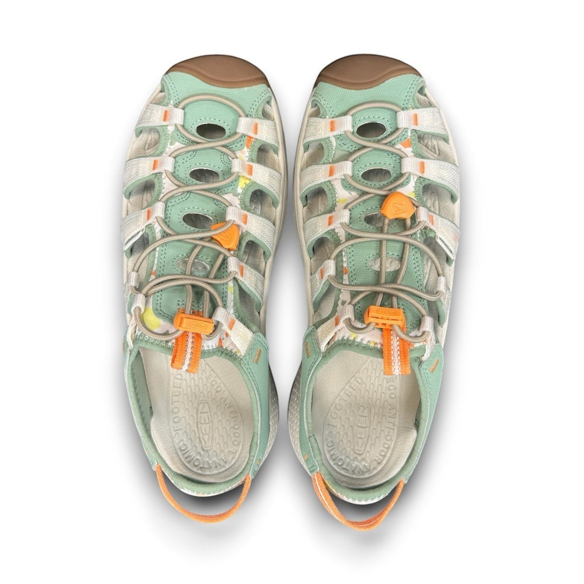 KEEN Astoria West women's hybrid water sandal in terrazzo/granite green with bungee laces and arch support.