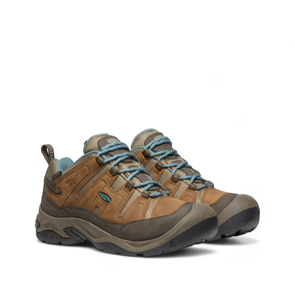 KEEN WOMEN'S CIRCADIA waterproof hiking shoe in syrup brown leather with blue accents and a grippy outsole.
