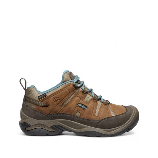 KEEN WOMEN'S CIRCADIA waterproof hiking shoe in syrup brown leather with blue accents and a grippy outsole.