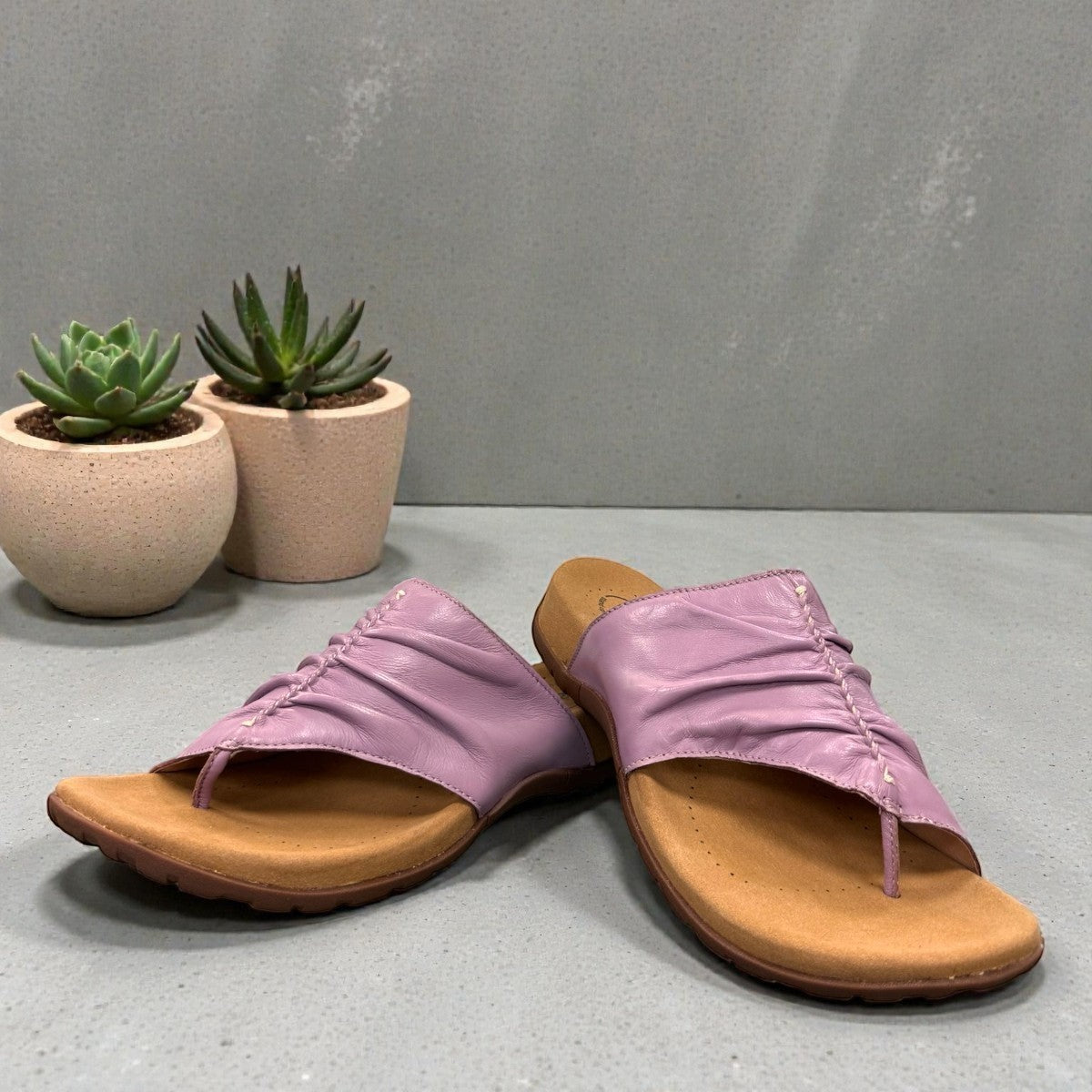 Taos Gift 2 lavender leather sandals with hand-stitched scrunch pleating and supportive foot bed. Photo of front view.