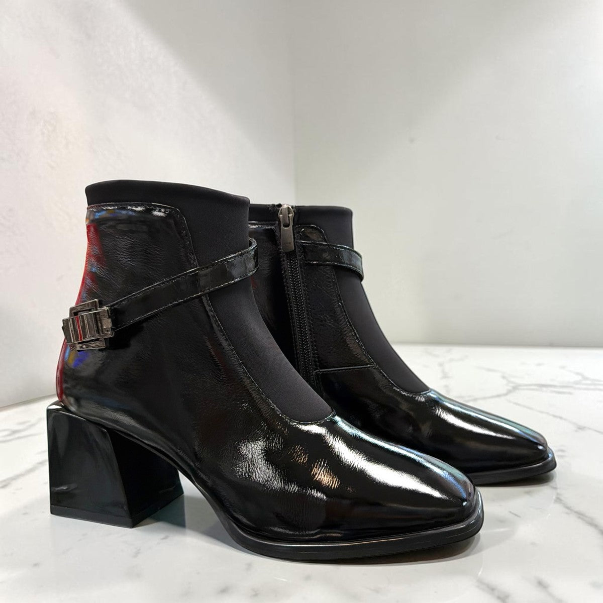 LOUJO AVERY black patent leather ankle boot with a functional side buckle and block heel