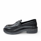 Luna sole pinky black leather loafer with a thick sole featuring white speckled detailing along the welt. Photo of left side view.