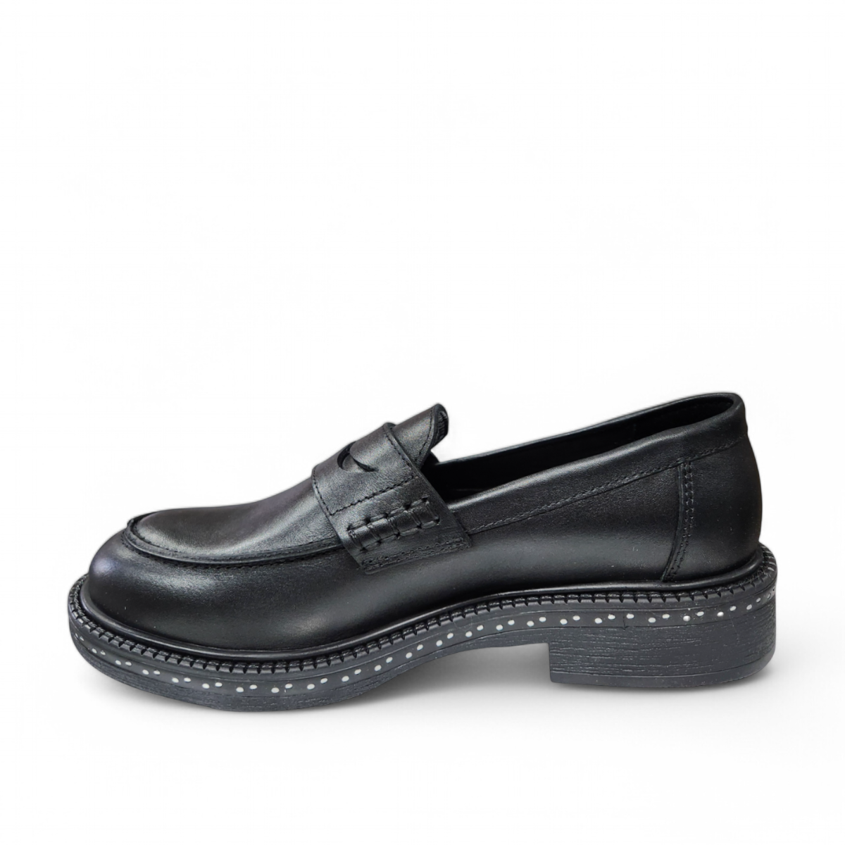 Luna sole pinky black leather loafer with a thick sole featuring white speckled detailing along the welt. Photo of left side view.