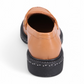 Luna Sole loafer in light tan smooth leather with a saddle strap, thick dark sole, and white speckled edge. Photo of back view.