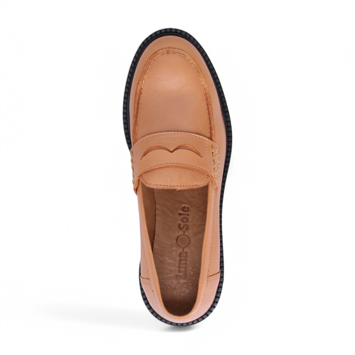 Luna Sole loafer in light tan smooth leather with a saddle strap, thick dark sole, and white speckled edge. Photo of upper view.