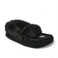 Manitobah Tipi black suede moccasins with rabbit fur trim and fleece lining for indoor comfort.
