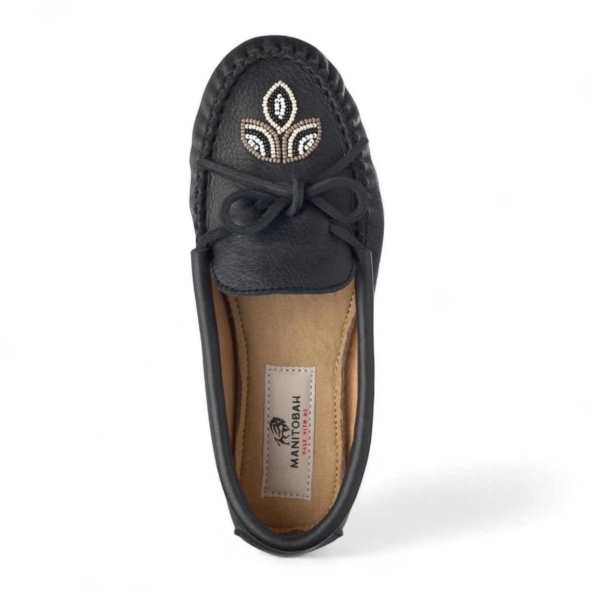 Manitobah Kayak moccasin in onyx black leather with traditional beadwork and turtle sole top view