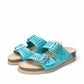 Mephisto Hester Perf turquoise sandalbuck mule showing the textured rubber outsole and cork midsole