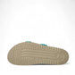 Mephisto Hester Perf turquoise sandalbuck mule showing the textured rubber outsole and cork midsole