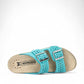 Mephisto Hester Perf turquoise sandalbuck mule showing the textured rubber outsole and cork midsole
