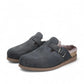 Mephisto Halexia deep blue mule showing the brown textured rubber outsole with branding