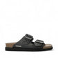 Mephisto Hester Perf black mule sandal showing the textured rubber outsole with reflex zone patterns