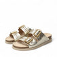 Mephisto Hester Perf gold mule showing the textured EVA shock-absorbing outsole with brand logo detail.