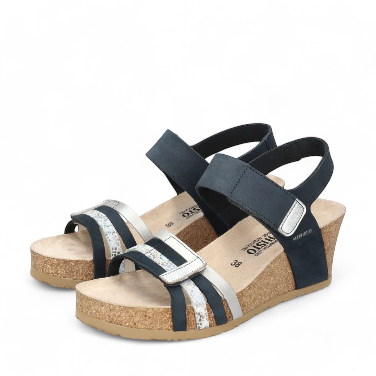 Mephisto Lucia navy leather wedge sandal showing the textured rubber sole and cork footbed