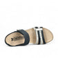 Mephisto Lucia navy leather wedge sandal showing the textured rubber sole and cork footbed