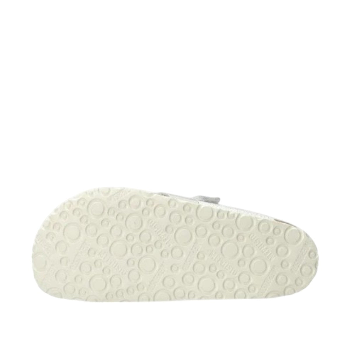 Mephisto Madalyn silver leather thong sandal showing the textured rubber outsole pattern