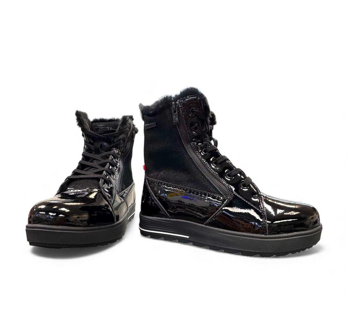 NEXGRIP Ice Marvel 2.0 black glossy leather winter boots with side zipper and faux fur trim.
photo of the front side