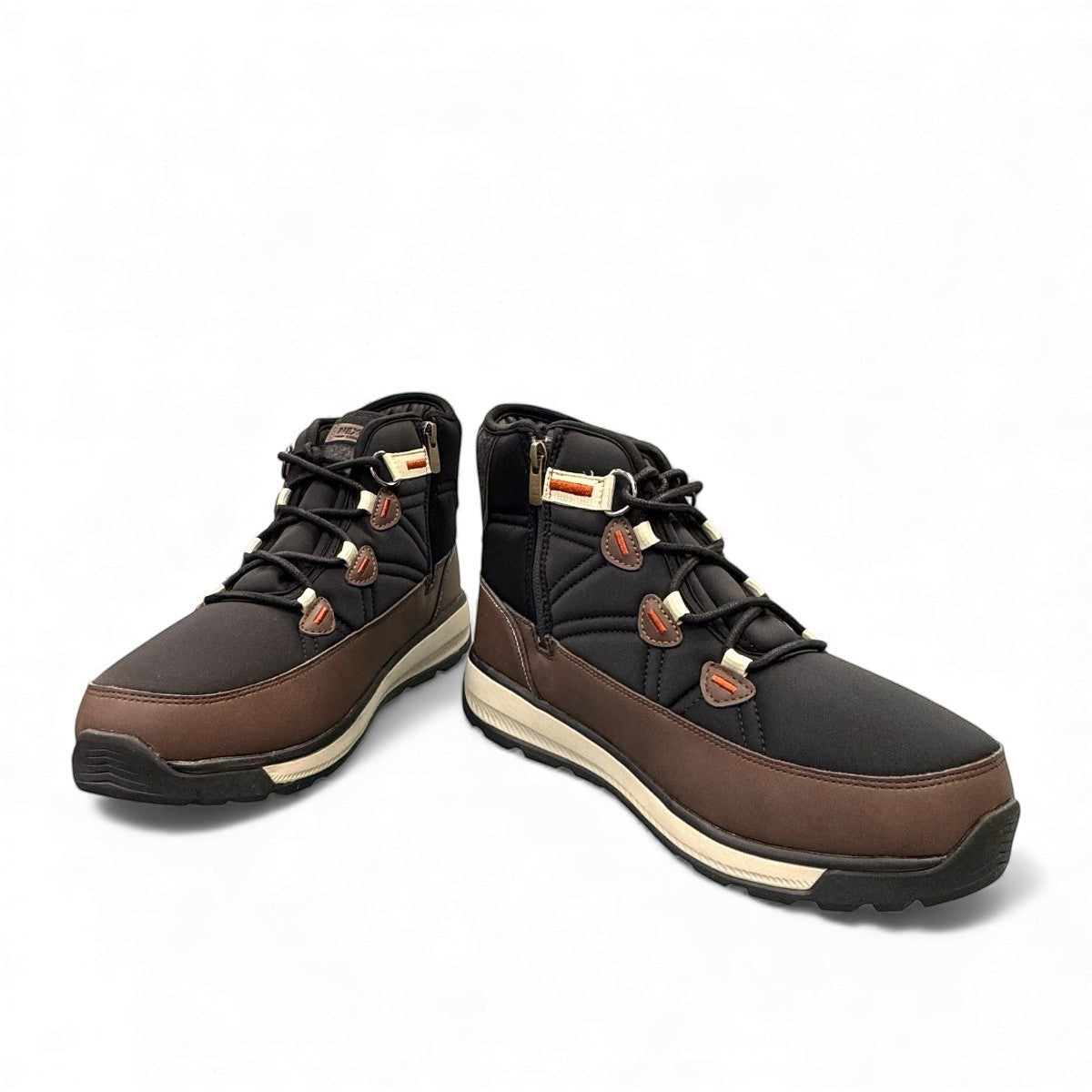 NexGrip Wonder Mid 2E charcoal waterproof winter boot with retractable ice cleats and wool lining.
photo of the front side