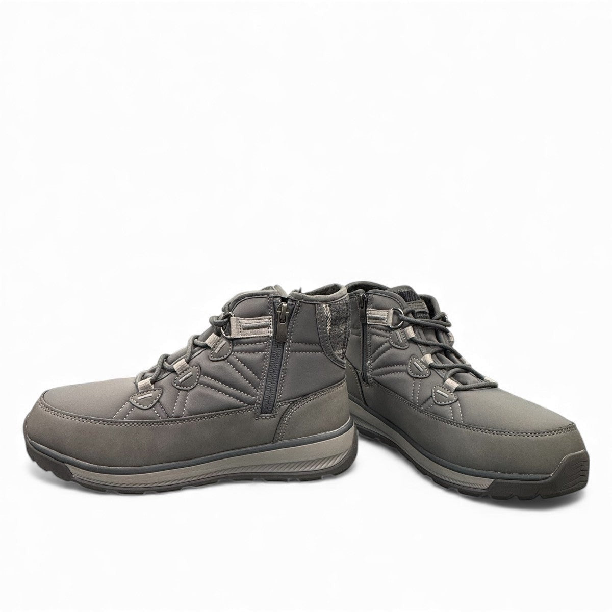 NexGrip Wonder Mid 2E charcoal waterproof winter boot with retractable ice cleats and wool lining.
photo of the front side