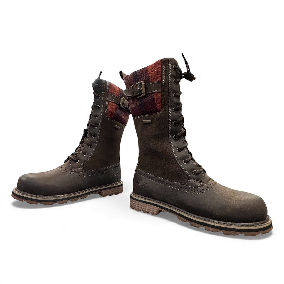 NEXGRIP ICE JENNA 5.0 chocolate brown waterproof winter boot with plaid cuff, lace-up front, and buckle.
photo of the THE front side