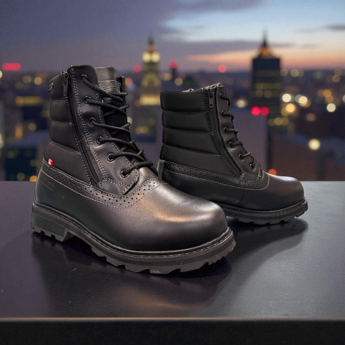 NEXGRIP ICE KIM 6.0 black leather winter boot with side zipper, quilted collar, and rugged rubber sole.
photo of the front side