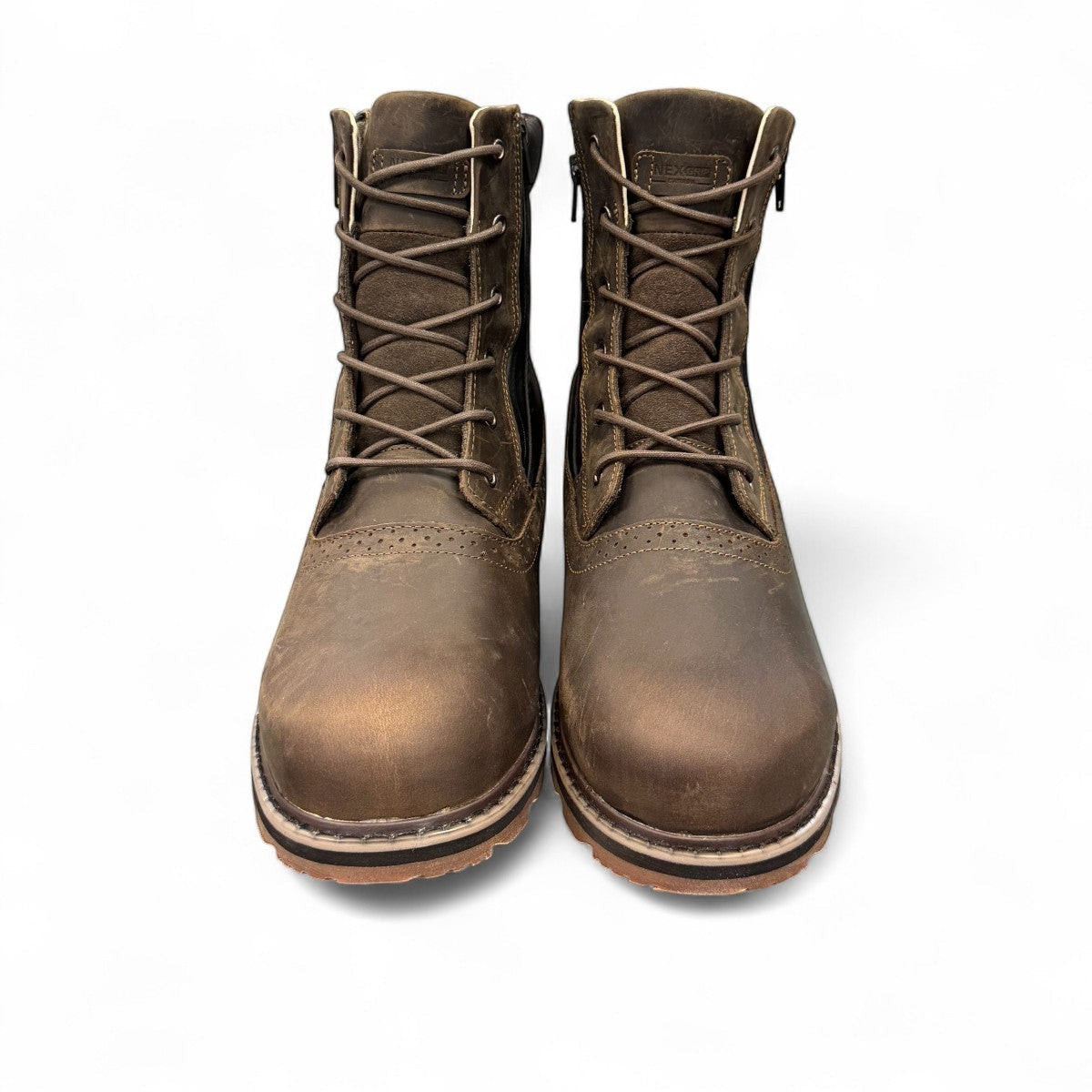 NexGrip Ice Kim 6.0 oatmeal leather winter boots with side zipper and rugged ice grip sole.
photo of the top side